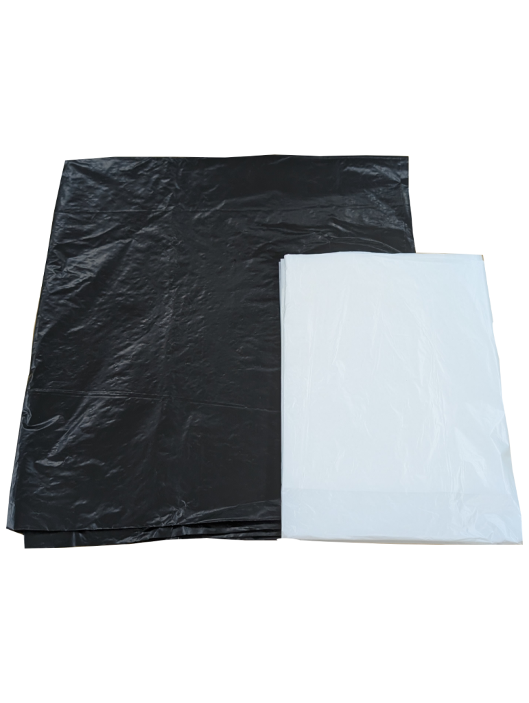 Black and white large plastic bags side by side